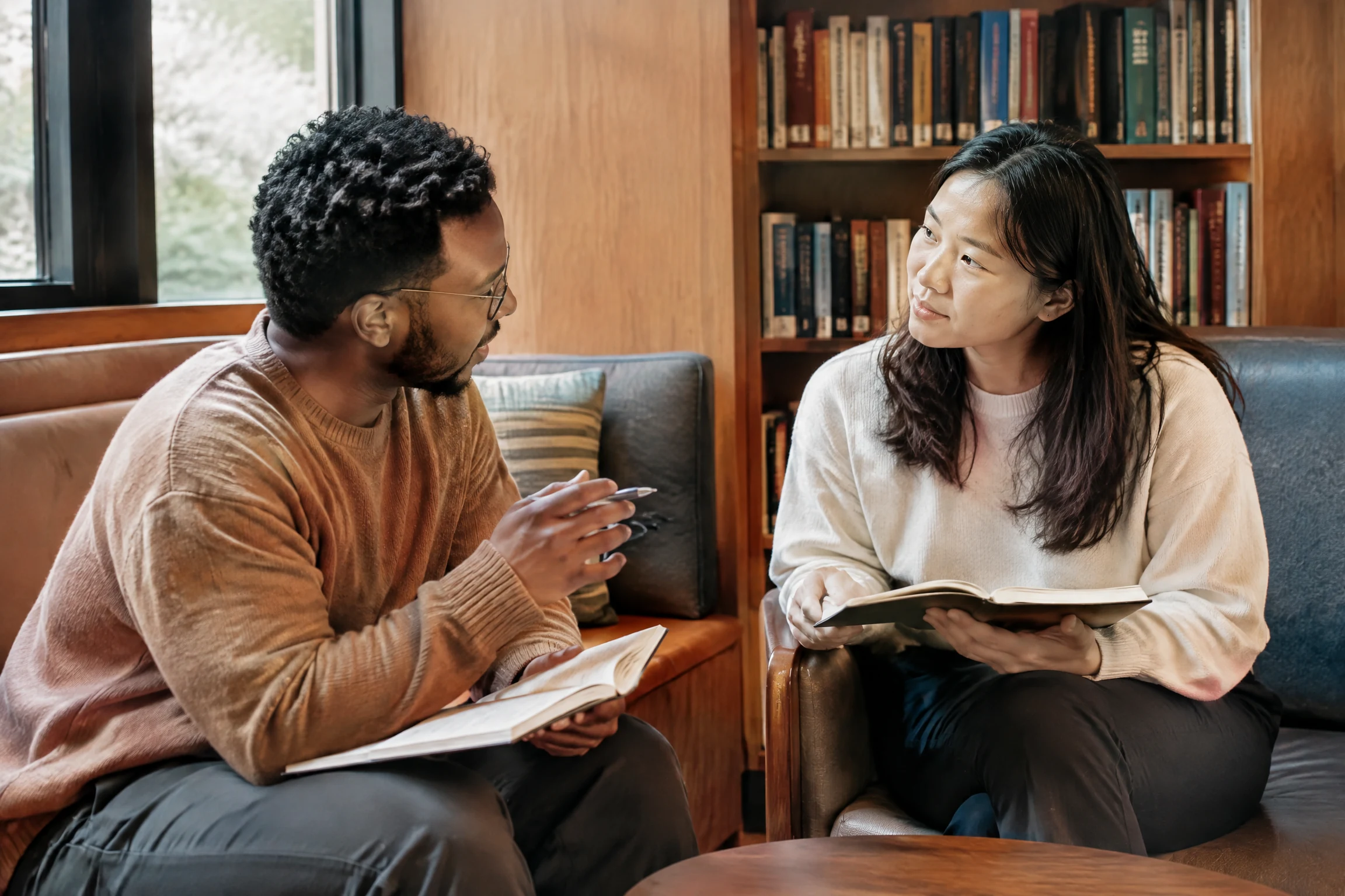 Two people talking through a career decision